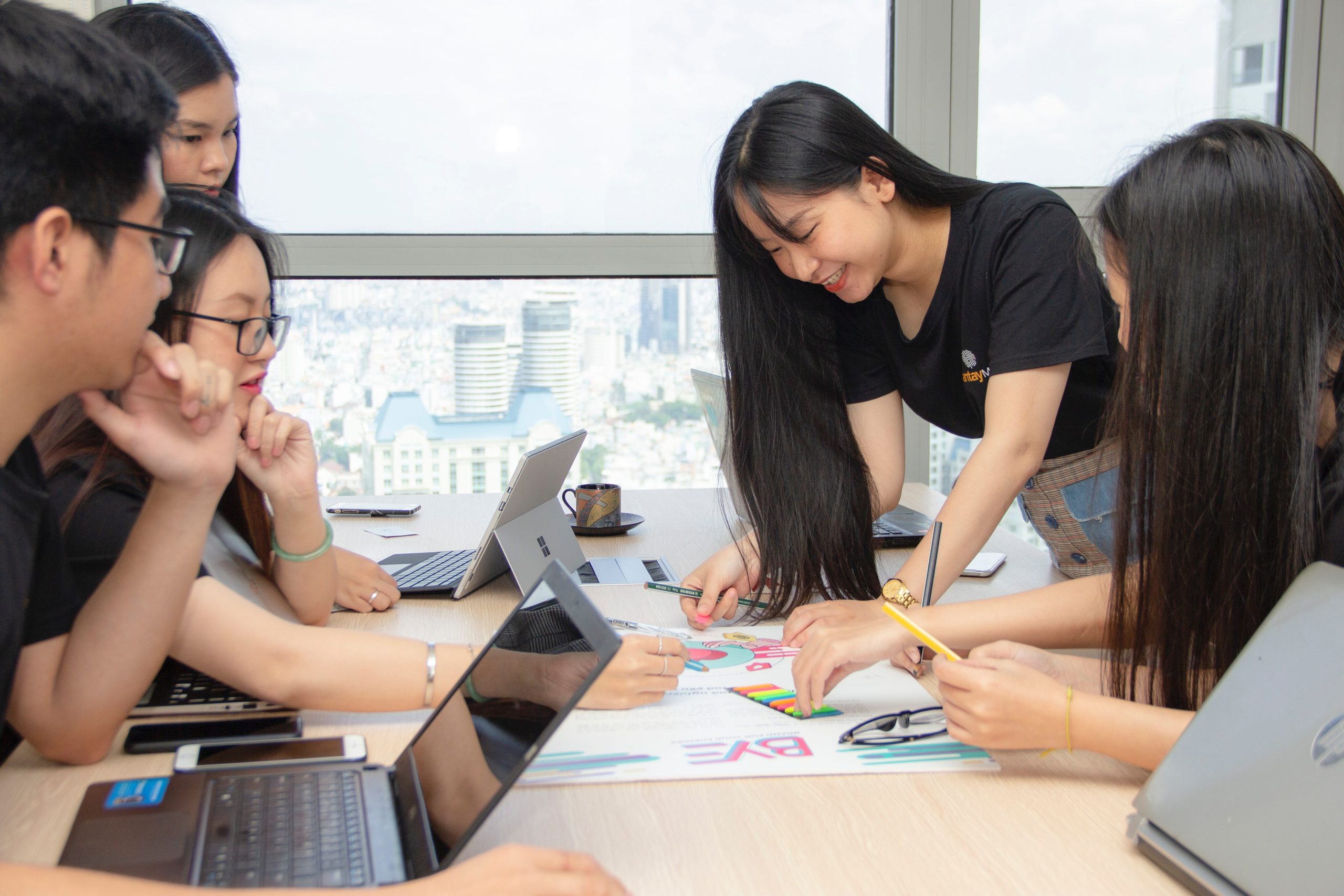 Girls working at desk together.